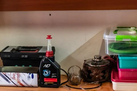 A cute tinker shelf - there is tool box and grease Stock Photos