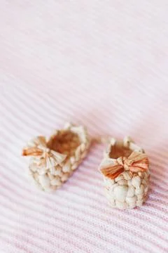 Cute tiny sandals made of straw, ancient traditional russian type of footwear 스톡 사진