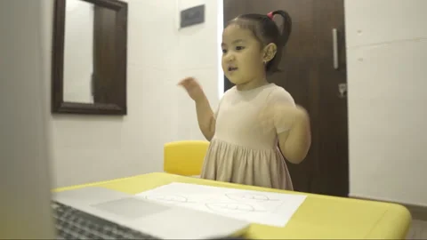 Cute toddler learning to dance via online class Stock Footage 158940866
