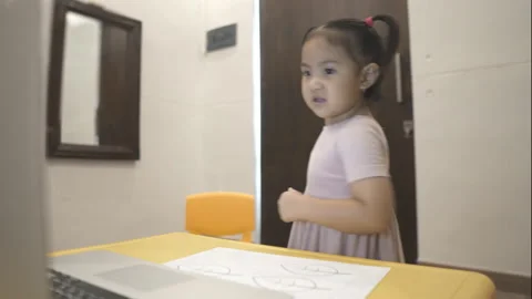 Cute toddler learning to dance via online class Stock Footage 158941285