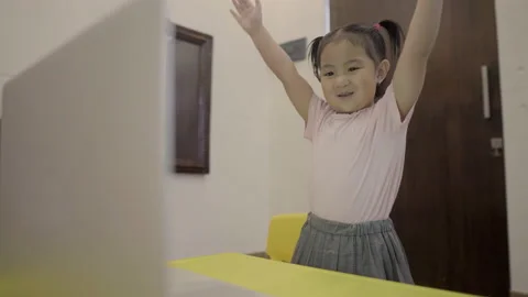 Cute toddler learning to dance via online class Stock Footage 158941561