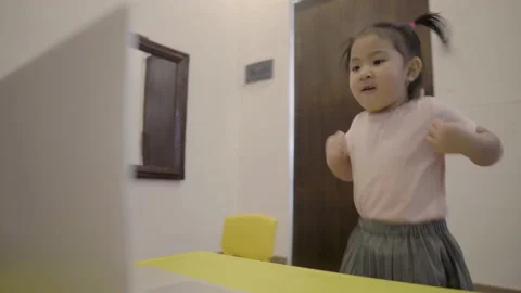 Cute toddler learning to dance via online class Stock Footage 158941724