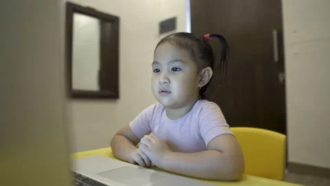 Cute toddler ready for online learning during pandemic Stock Footage 158940887