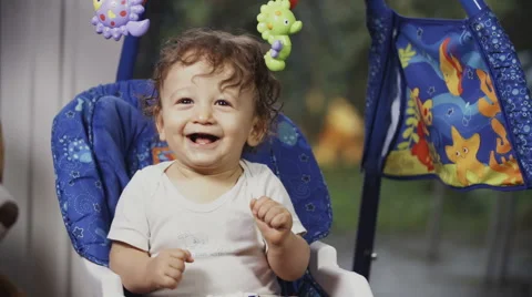 Cute Toddler on a Swing Stock Footage 49732434