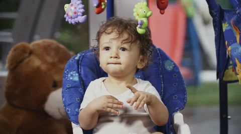 Cute Toddler on a Swing Stock Footage 49732439
