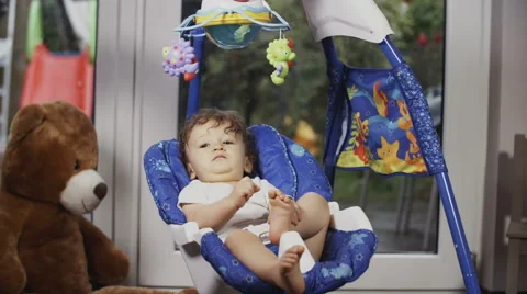 Cute Toddler on a Swing Stock Footage 49732688