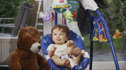 Cute Toddler on a Swing Stock Footage 49732826