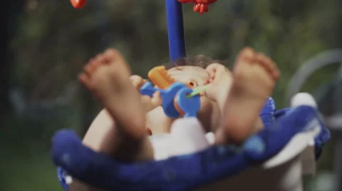 Cute Toddler on a Swing Vidéo 49734073