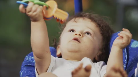 Cute Toddler on a Swing Stock Footage 49734147