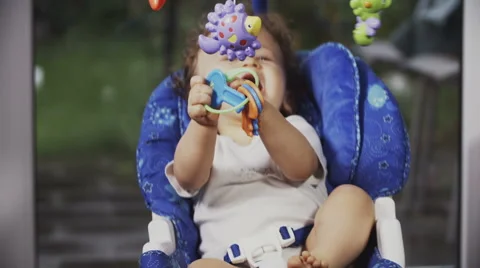 Cute Toddler on a Swing Stock Footage 49734176
