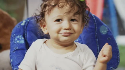 Cute Toddler on a Swing 動画素材 49734231