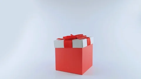 Cute white Bunny in red present box with a bow, stands up on two legs Stock Footage 103509526