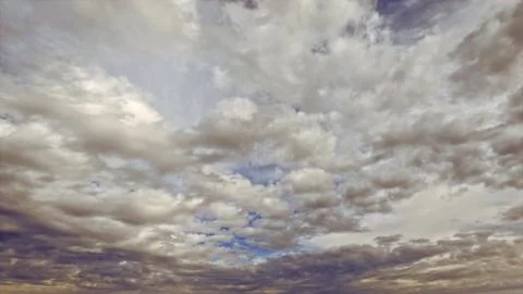 Cute white clouds overcast cloudscape backdrop - photo of nature Stock Photos