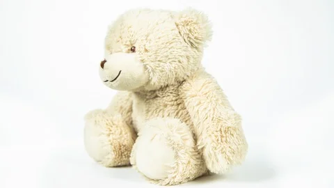 Cute white teddy bear rotating on white background. Stock Footage 127247364