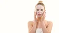 The cute woman with a clean mask touching the face on the white background 4k or 4k+ Resolution