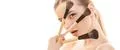 The cute woman holding cosmetic brushes on the white background Photo