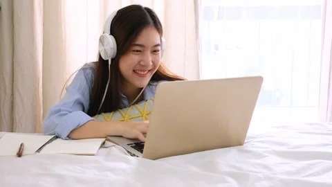 Cute woman learning course online with laptop Stock Footage 132334853
