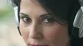 cute woman listening to music on big headphone HD Footage