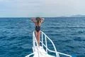 The cute woman pose on the yacht Photo