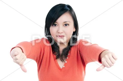 Cute woman showing thumbs down gesture Stock Photos