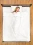 The cute woman sleeping on the bed. View from above Photo