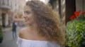 The cute woman walk on the street. Slow motion. Wide angle 4k or 4k+ Resolution