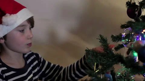Cute Young Boy Decorates Tree#2 Stock Footage 45660083