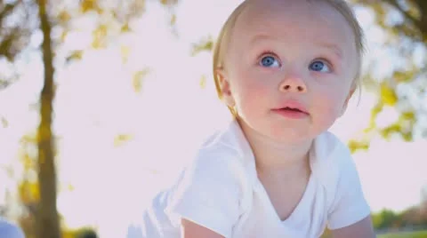 Cute Young Child Outdoors in Close up Stock Footage