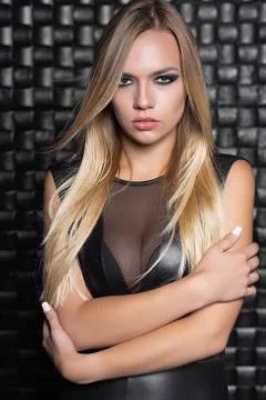Cute young lady posing in the studio. Stock Photos