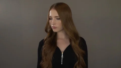 Cute young model poses for the camera Stock Footage 99703402