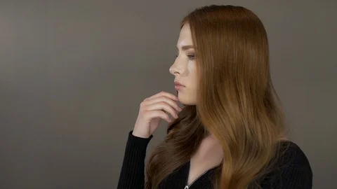 Cute young model poses for the camera Stock Footage 99704057