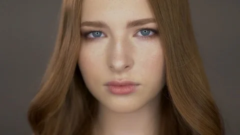 Cute young model poses for the camera. She is looking at the camera Stock Footage 99715350