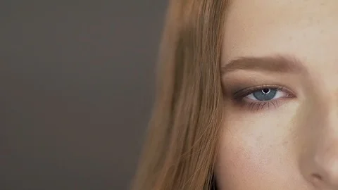 Cute young model poses for the camera. eyes close up Stock Footage 99715367