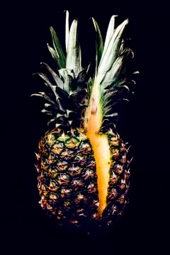 Cuted in half pineapple Stock Photos