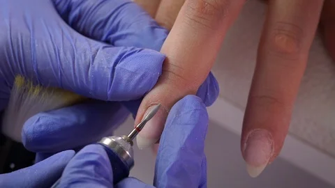 Cuticle removal macro glasses Stock Footage 103830740