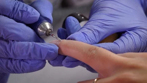 Cuticle removal macro thumb Stock Footage 103830736