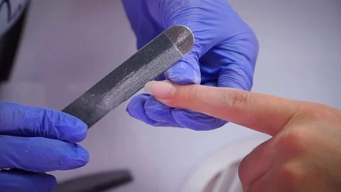 Cuticle removal with a tool Stock Footage 103830696