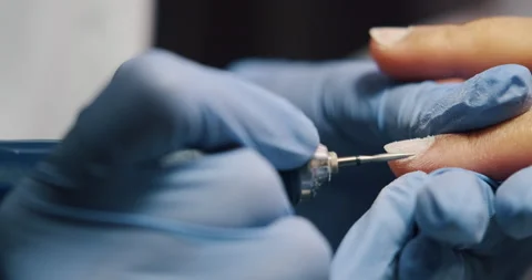 Cuticle removing with electrical tool, nail care and cleaning, polish process. Video stock 132223121