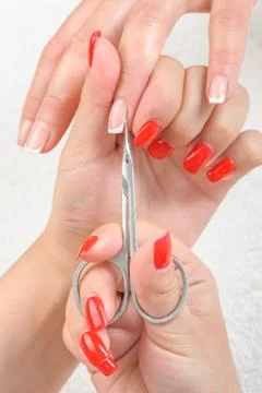 Cuticles cutting with scissors 스톡 사진