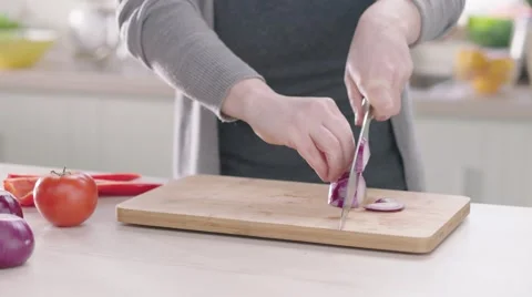 Cuting onion. Slow motion 200fps Stock Footage 46490673