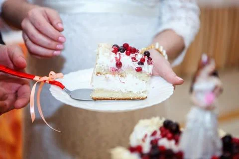 Cuting a wedding cake Stock Photos