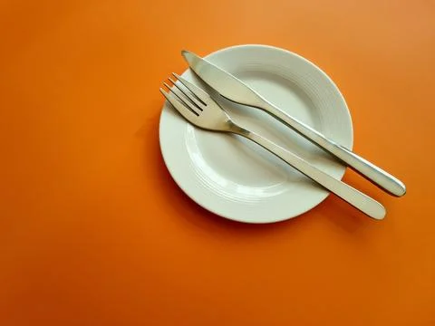 Cutlery on a plate Stock Photos