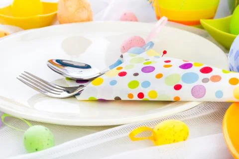 Cutlery wrapped napkin Easter table Stock Photos
