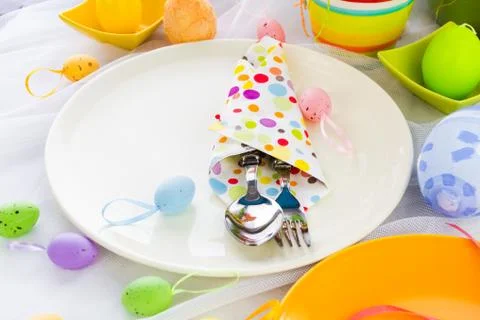 Cutlery wrapped napkin Easter table Stock Photos