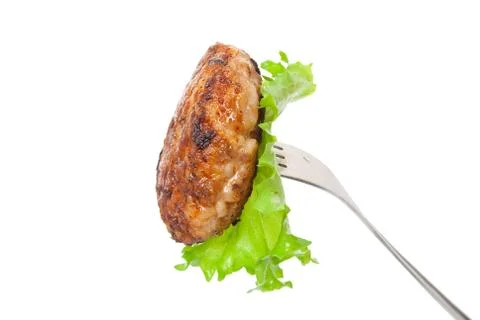 Cutlet on a fork Stock Photos
