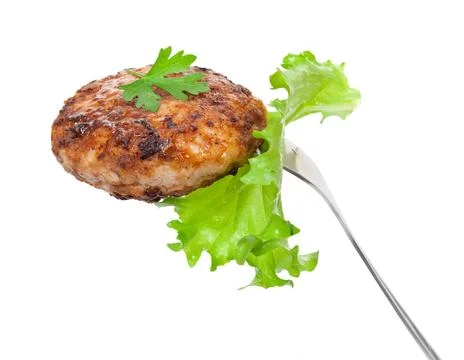 Cutlet on a fork Stock Photos