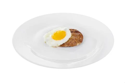 Cutlet, steak with fried eggs isolated white Stock Photos