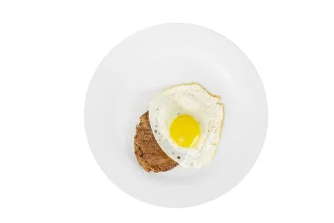 Cutlet, steak with fried eggs isolated white Stock Photos