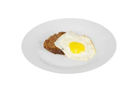 Cutlet, steak with fried eggs isolated white Stock Photos