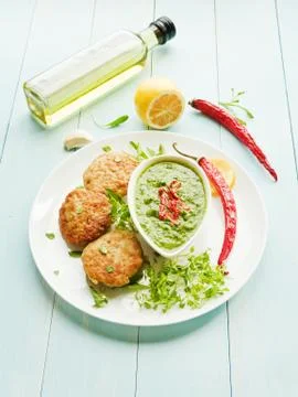 Cutlets and sauce Stock Photos